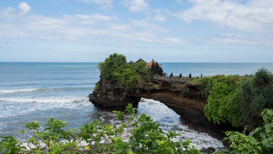 Stunning coastal view of Tanah Lot, a famous sea temple in Bali, Indonesia.