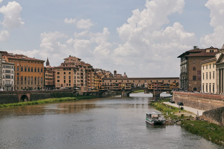 Beautiful view of the Ponte Vecchio bridge over the Arno River in Florence, Tuscany.