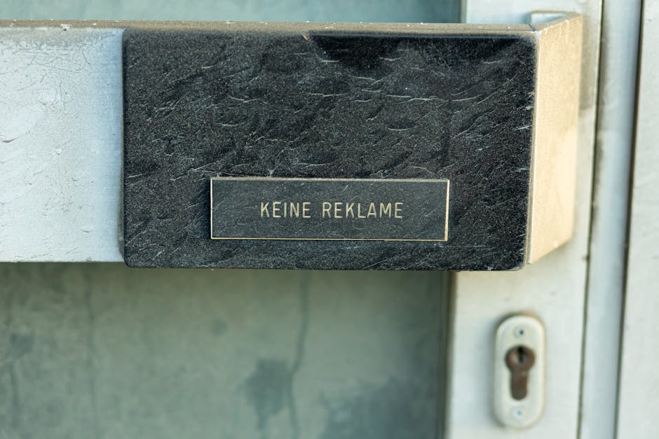 Sign reading 'Keine Reklame' on a door in Austria, no advertising.